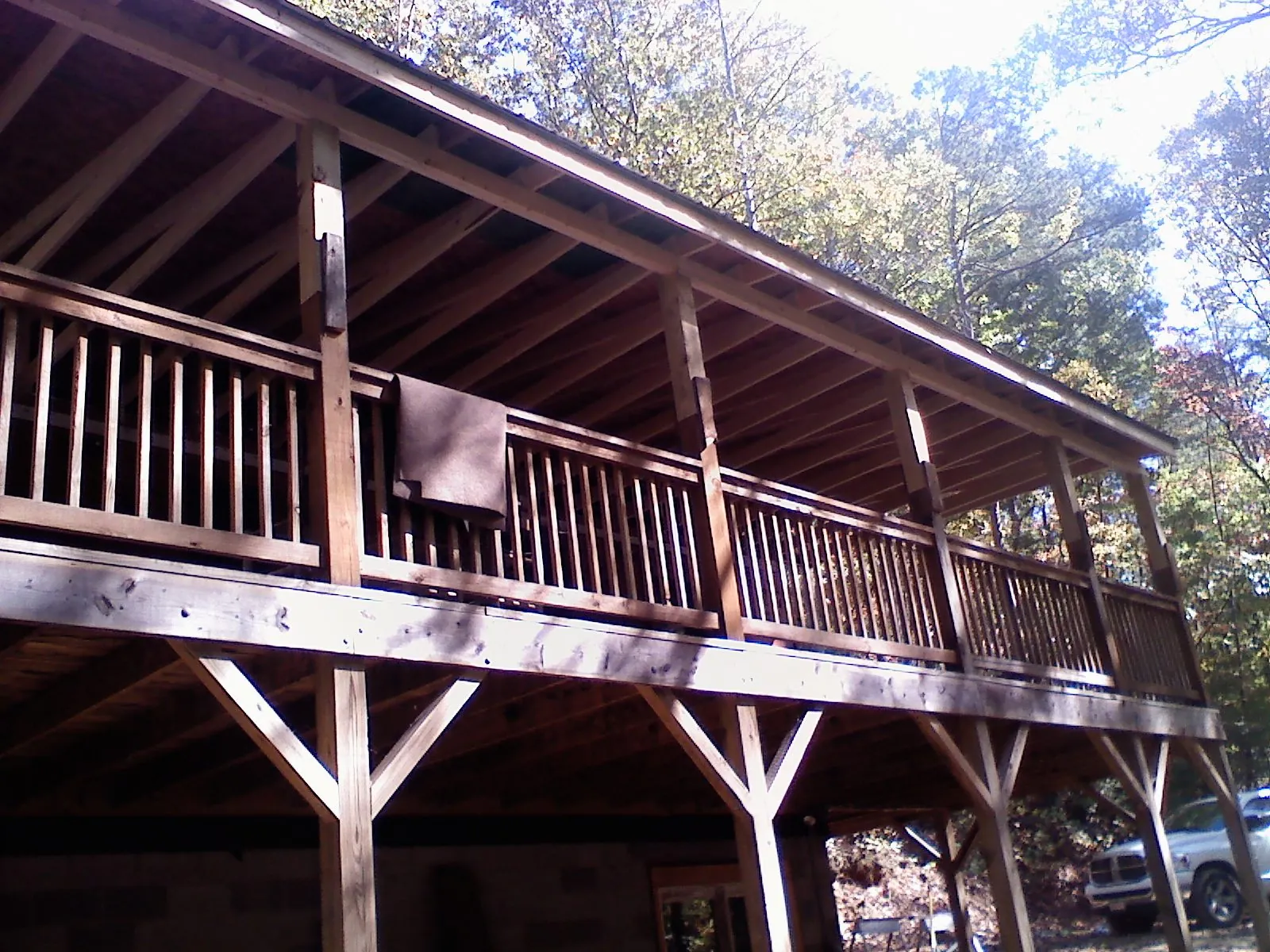 Timber framing under a new elevated porch and deck — Roof Leak Repair in Duck Creek Village by Roofing Brothers